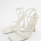 HIGH HEELED STRAPPY SANDALS